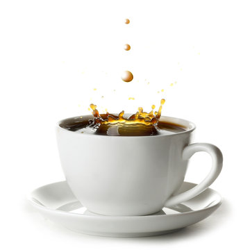 Coffee splash in cup