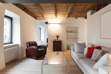 comfortable loft furnished, living room.