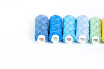 Colored threads on a white background
