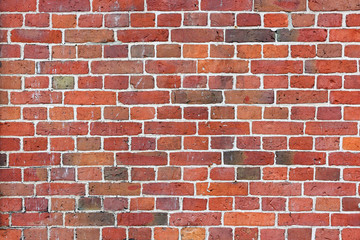 Bricks wall of red bricks with white cement
