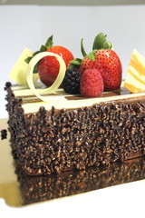 Dark chocolate cake with sour strawberry.