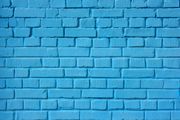 The brick wall painted in blue