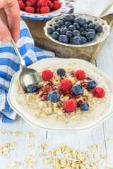 Oatmeal porridge with fresh berries