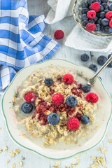 Oatmeal porridge with fresh berries