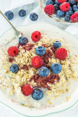 Oatmeal porridge with fresh berries