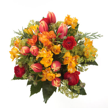Bouquet made of Tulips, Ranunculus and Freesia flowers seen from