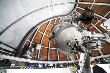 Modern astronomy telescope in an astronomical observatory.