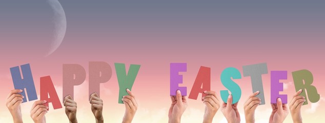 Composite image of hands holding up happy easter