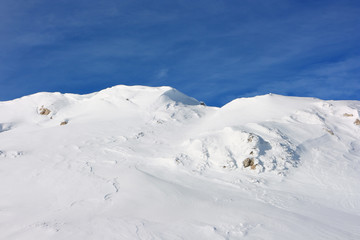 Fototapeta na wymiar Ice cold desert. Winter landscape of high mountains of the Crimean in sunny weather.