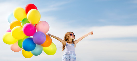 happy girl with colorful balloons