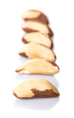 Brazil nuts over white background