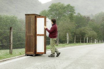 wooden wardrobe with a man