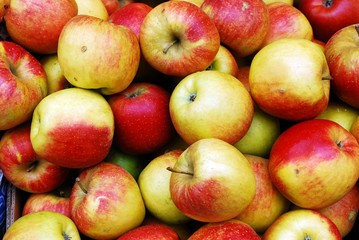 Fresh red ripe apples background