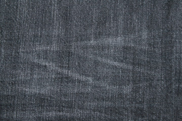 Fototapeta na wymiar Black stone-washed Jeans denim cloth