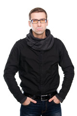 Obraz premium Fashionable young man in casual wear posing against white backgr