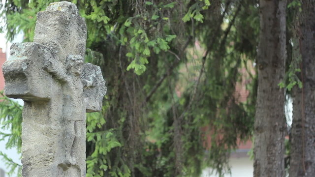 Ancient Stone Cross with Christ on