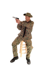 Soldier pointing a pistol.