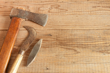 dated and used cleaver on wooden background