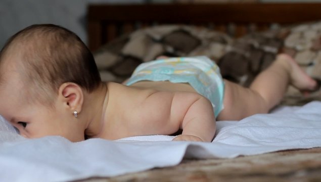 Baby Practising Gymnastics Exercises