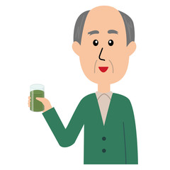 A happy elderly man with a glass of green smoothie in his hand