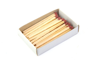 Bunch of matches on a box on white background