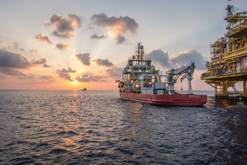 supply boat when sunset