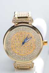 gold watch with diamonds