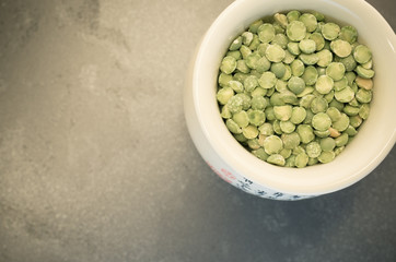 dried split peas in a cup