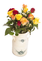 roses in a shabby chic vase
