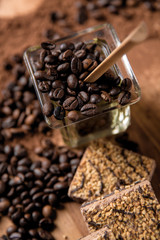 Dark concept with coffee on wooden table, organic