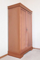 Brown wooden wardrobe