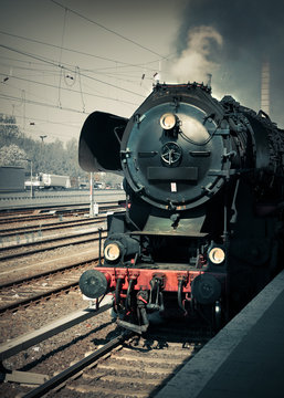 Historical German steam locomotive, toned image © tilialucida