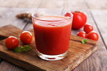 Glass of tomato juice with cherry tomatoes