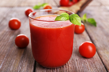 Glass of tomato juice with cherry tomatoes