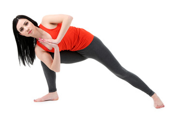 Young woman doing yoga isolated on white