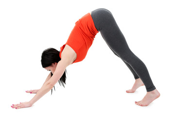 Fototapeta premium Young woman doing yoga isolated on white