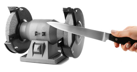 Sharpening knife process isolated on white