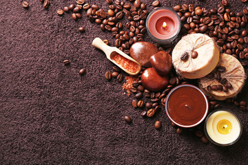Fototapeta na wymiar Composition of soap, chocolate in bowl and coffee beans