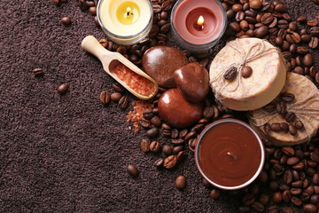 Composition of soap, chocolate in bowl and coffee beans