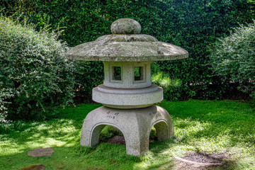 Fototapeta na wymiar Scenic stone made arbour in Japanese Garden, Hamilton