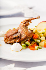 quail with salad on Christmas table