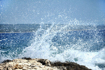 Rocky coast with splashing waves