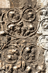 Detail of carved stone with grape