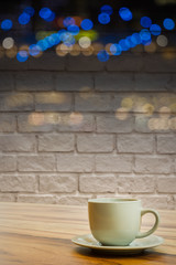 cup of drink and night view
