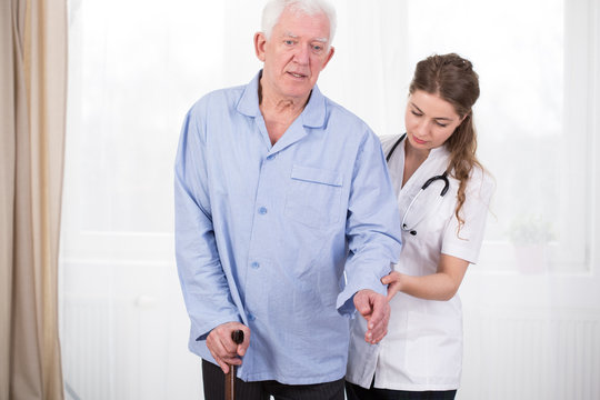 Patient Using Walking Stick