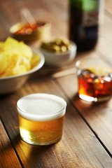 Beer glass with appetizers