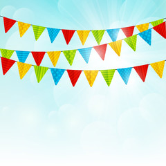 Color party flags on sunny background