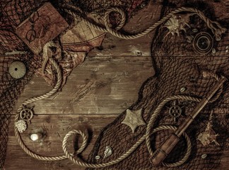 Sea concept on a wooden table background