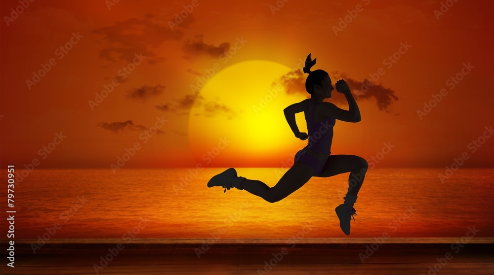 Poster Composite image of fit brunette running and jumping
