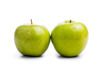 Two wet fresh green apple on isolated white backround, the pantone color of the year 2017, Greenery 15-0343